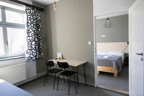 Postel nebo postele na pokoji v ubytování Hotel Spálov
