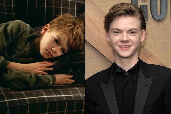 Thomas Brodie-Sangster in 'Love Actually,' 2003; Thomas Brodie-Sangster attends the 'Godless' New York premiere at The Metrograph on Nov. 19, 2017, in New York City