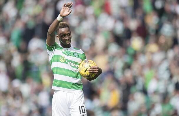 Waving Moussa Dembele of Celtic takes away the match ball having scored 3 of the 5 goals during the Ladbrokes Scottish Premiership match between Celtic and Rangers at Celtic Park