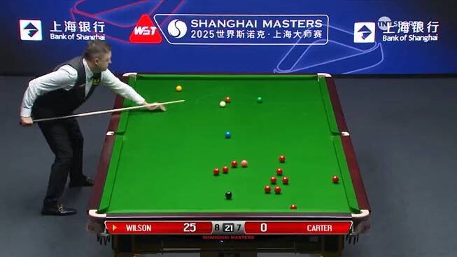 Snooker player taking a shot at the Shanghai Masters.