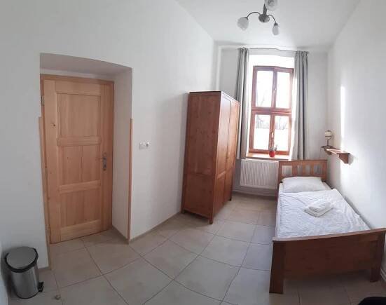 Postel nebo postele na pokoji v ubytování Penzion a restaurace U Hájků
