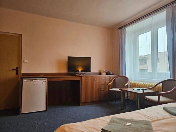 TV a/nebo společenská místnost v ubytování Hotel Trim