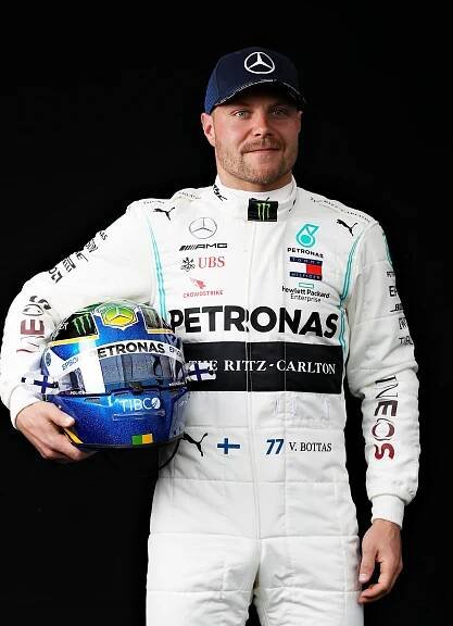 Portrait of Valtteri Bottas in his Mercedes Formula One racing suit.