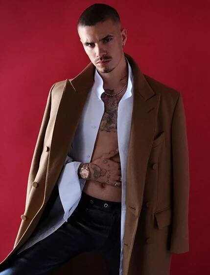 Romeo Beckham spitting image of dad David as he strips off for magazine shoot