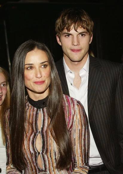 Demi Moore in a sparkly top with Ashton Kutcher in 2003