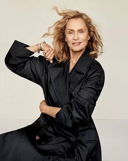 A woman in black pajamas posing for the camera.