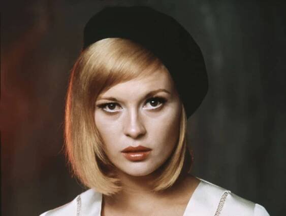 Iconic Hollywood Actress Faye Dunaway in a vintage 1967 portrait Wallpaper