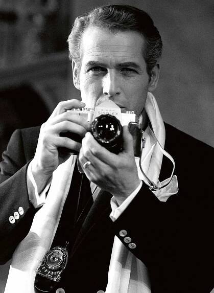 American actor Paul Newman on the stage set of "Baby Want a Kiss", co-starring Joanne Woodward at the Helen Hayes Theatre, New York, April 1964