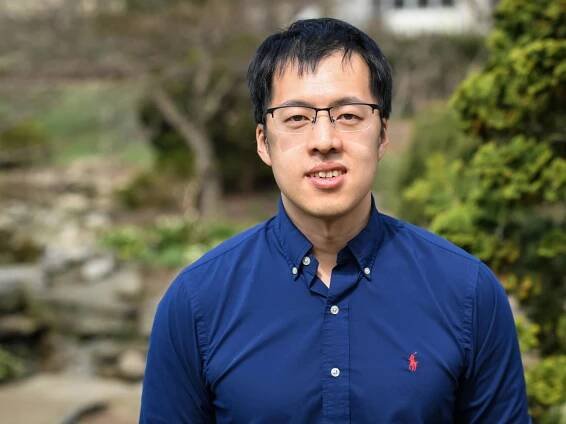 An outdoors portrait of an individual.