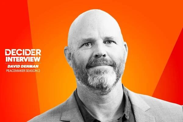 David Denman in black and white on an orange background