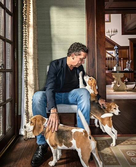 Tony Buzbee petting all three of his beagles. 