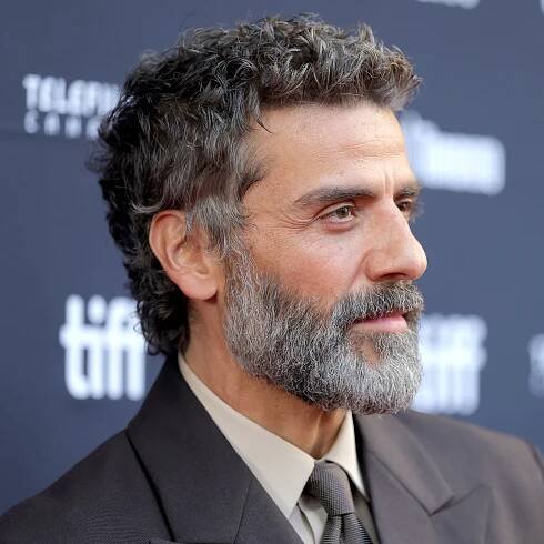 Oscar Isaac drops a baby mullet for men with mortgages
