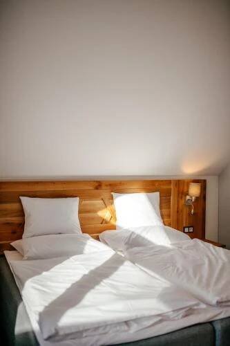Postel nebo postele na pokoji v ubytování Resort CATTALEYA
