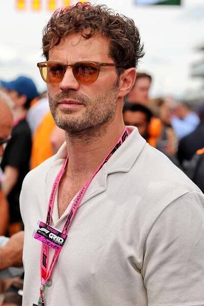 Jamie Dornan is spotted on the grid during race day at the Hungarian Grand Prix in Budapest, soaking in the 