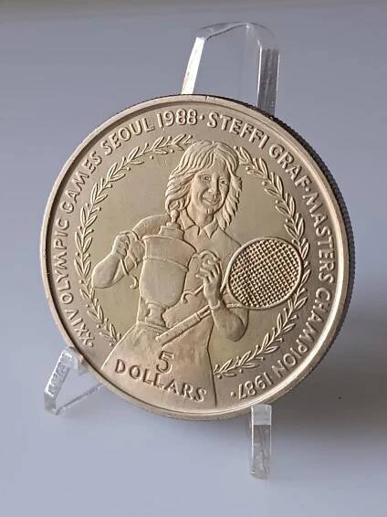 Niue 5 dolarů 1988 - Olympiáda Tenis Steffi Grafová (L15)
