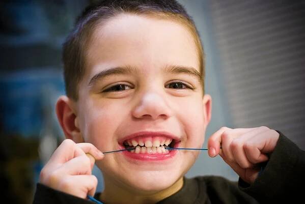 Why Flossing Your Child’s Teeth Is So Important