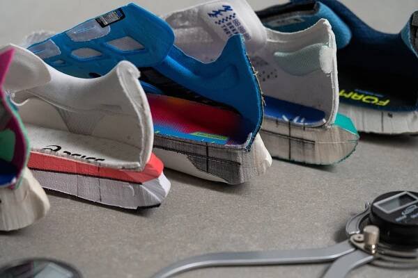 Stacked halves of running shoes