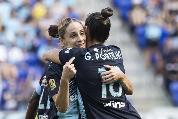 NY/NJ Gotham FC players Esther González and Gabi Portilho celebrating a goal.