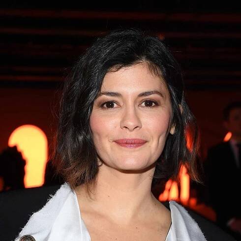 Audrey Tautou with soft brow and diamond face shape attends the Balmain show as part of the Paris Fashion Week