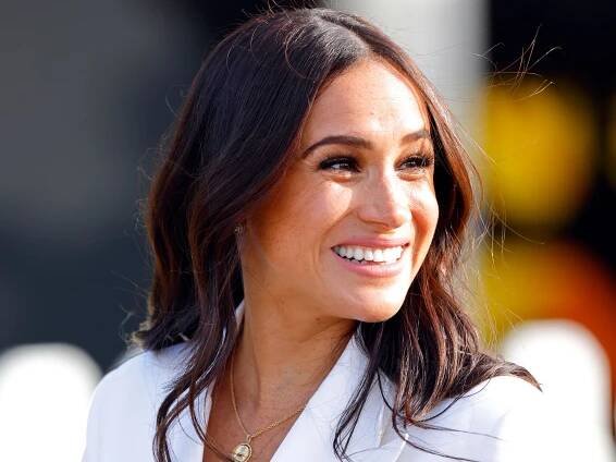 Meghan Markle shares never-before-seen photos of her kids and bare baby bump for special occasion