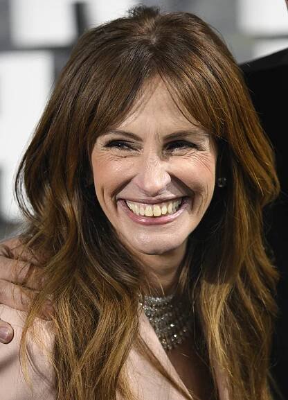 Julia Roberts v oslnivém růžovém kostýmku a úchvatných botách od Gucciho představila svůj nový film