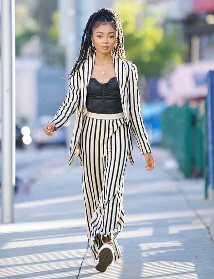 Skai Jackson Steps Out in Striped Pant Suit for Dinner at Katana. 14 Jun 2021 Pictured: Skai Jackson