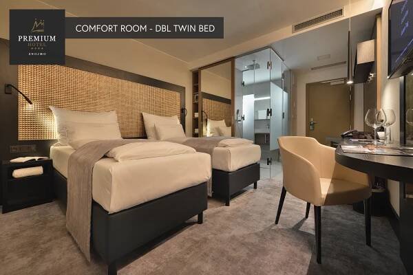 Postel nebo postele na pokoji v ubytování PREMIUM Wellness & Wine Hotel Znojmo