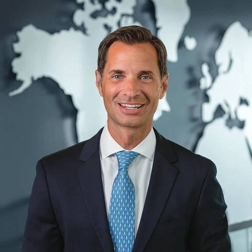 A Moment With... John M. Holmes - Acumen Stories