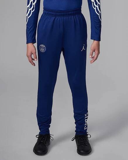 Fotbalové čtvrté pleteninové tréninkové kalhoty Jordan Dri-FIT Paris Saint-Germain Strike pro větší děti