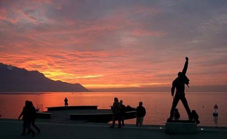 Freddie Mercury statue at sunset in Montreux.
