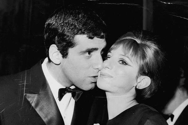 Pictured: (L-R) Elliot Gould and Barbra Streisand in London on April 13, 1966