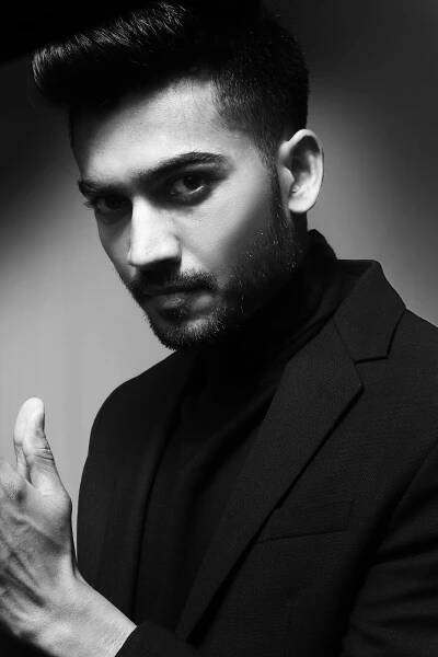 man in black suit jacket