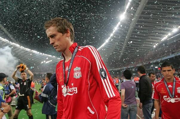 Peter Crouch and Steven Gerrard celebrating a Liverpool goal.