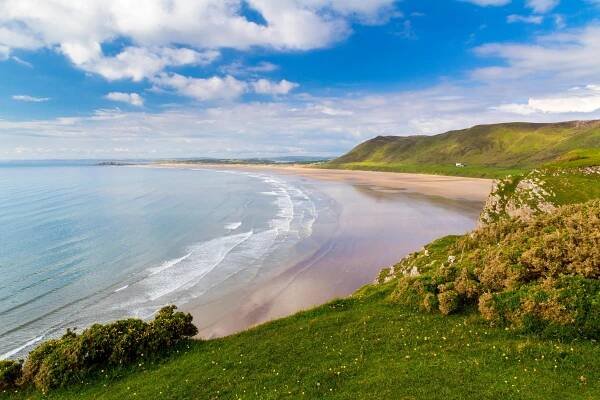 Aerial view of Rhossili Bay in Wales.