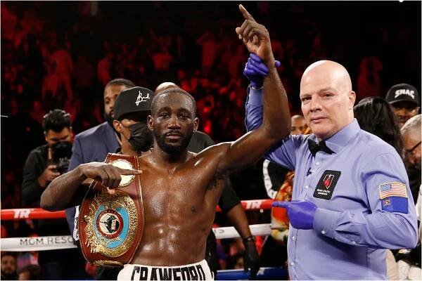 Terence Crawford poses for photographers after defeating Shawn Porter by TKO.