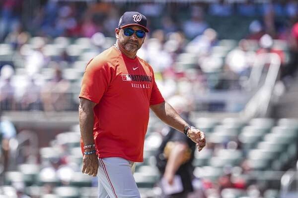 Dave Martinez, Washington Nationals manager, walking on the field.