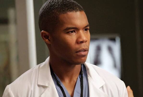 GREY'S ANATOMY, (from left): Gaius Charles, Sandra Oh (back to camera), 'I Was Made For Lovin You', (Season 9, ep. 907, aired Nov. 29, 2012), 2005-. photo: Richard Cartwright / ©ABC / courtesy Everett Collection