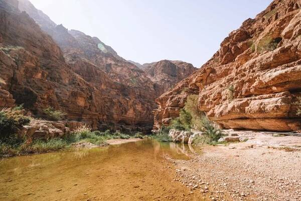 Wadi Shab in Oman: Swim in a Turquoise Wadi - TRAVELREBELS