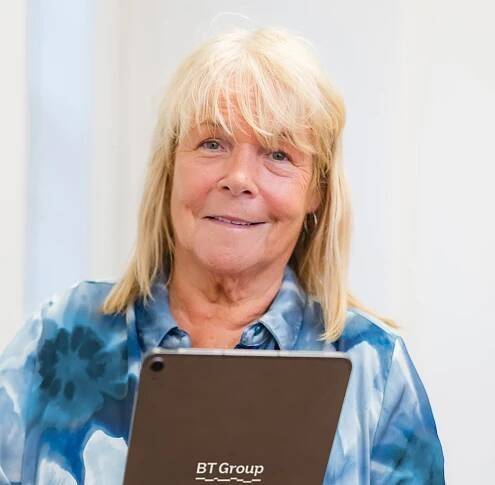 Linda Robson, holding BT Group branded laptop