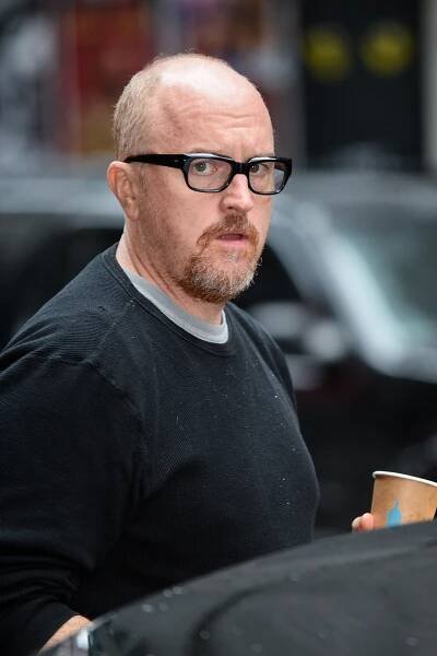 Image may contain Human Person Glasses Accessories Accessory Face Man Coffee Cup and Cup