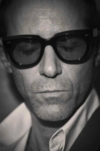Vest, shirt by GIORGIO ARMANI; sunglasses byJACQUES MARIE MAGE.