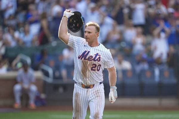 Mets first baseman Pete Alonso throws his helmet after hitting a walk off home run.
