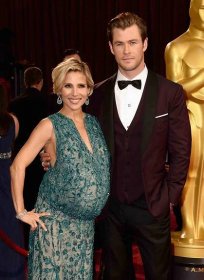Actors Elsa Pataky (L) and Chris Hemsworth attends the Oscars held at Hollywood & Highland Center on March 2, 2014 in Hollywood, California