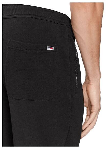 TOMMY HILFIGER PÁNSKÉ TEPLÁKY TJM REG ZIP SPRAY SWT PANT ČERNÉ L Barva černá