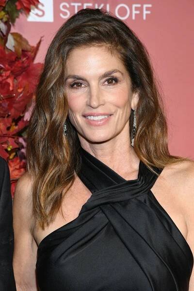 Cindy Crawford Goes Topless for a Quick Dip in Nature