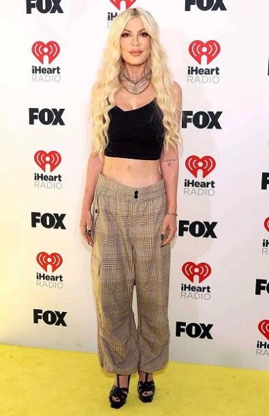 Tori Spelling attends the 2024 iHeartRadio Music Awards at Dolby Theatre in Los Angeles, California on April 01, 2024. Broadcasted live on FOX.