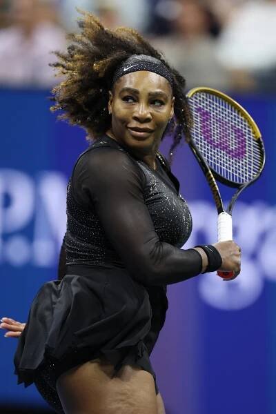Serena Williams playing tennis at the 2022 US Open