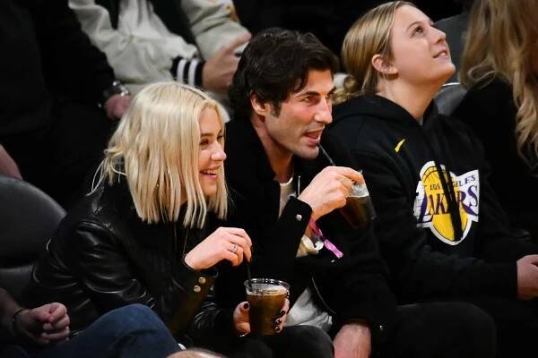 Ashley Benson and Brandon Davis watching the Los Angeles Lakers and the Miami Heat game