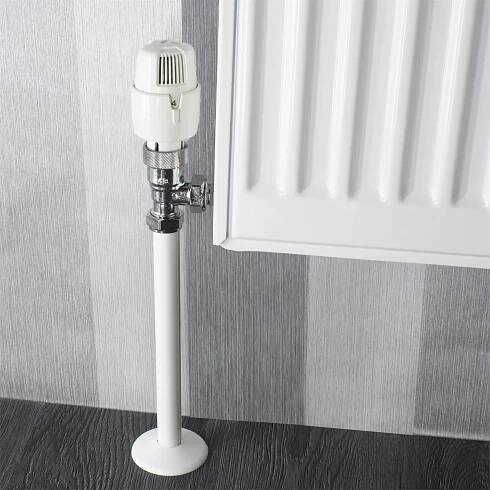Wood flooring fitting. Pipe covers.
