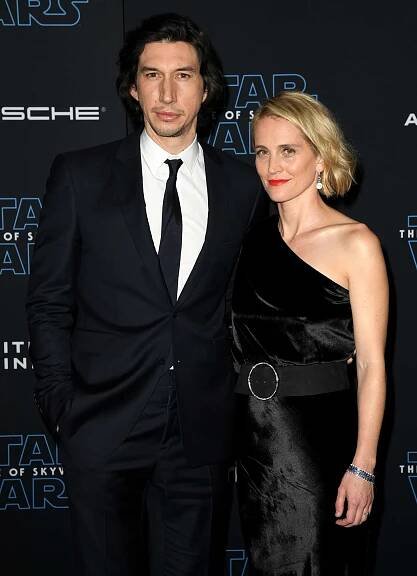 Adam Driver (L) and Joanne Tucker arrive at the premiere of Disney's 